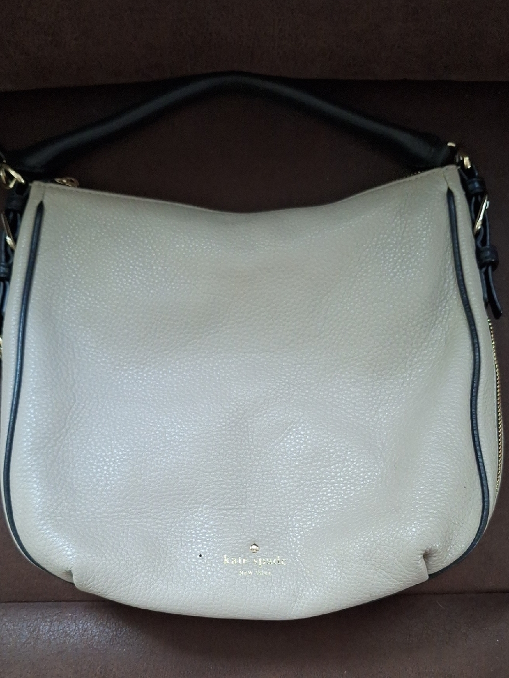 kate spade Cream Pebbled Leather Crossbady Hobo with Black Trim